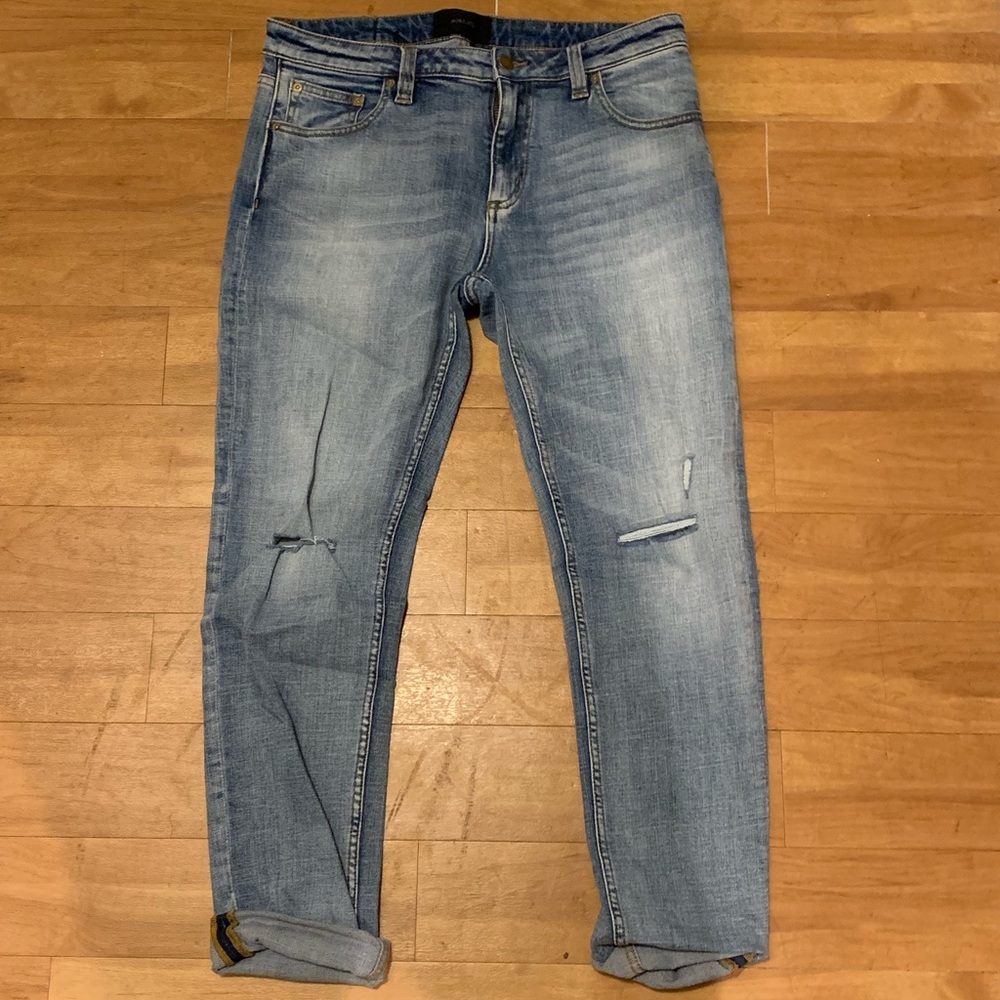 Rollas ripped light wash jeans